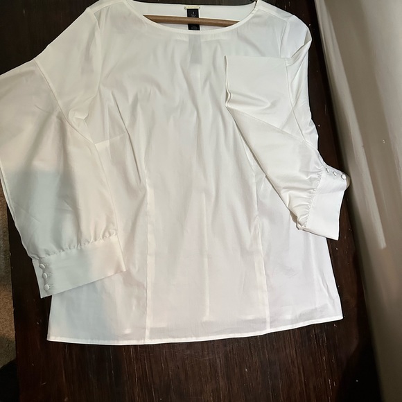 WHITE BLOUSE WITH DRAPED OPEN ARM SLEEVE WITH ELEGANT BUTTON CLOSURE - Picture 1 of 9